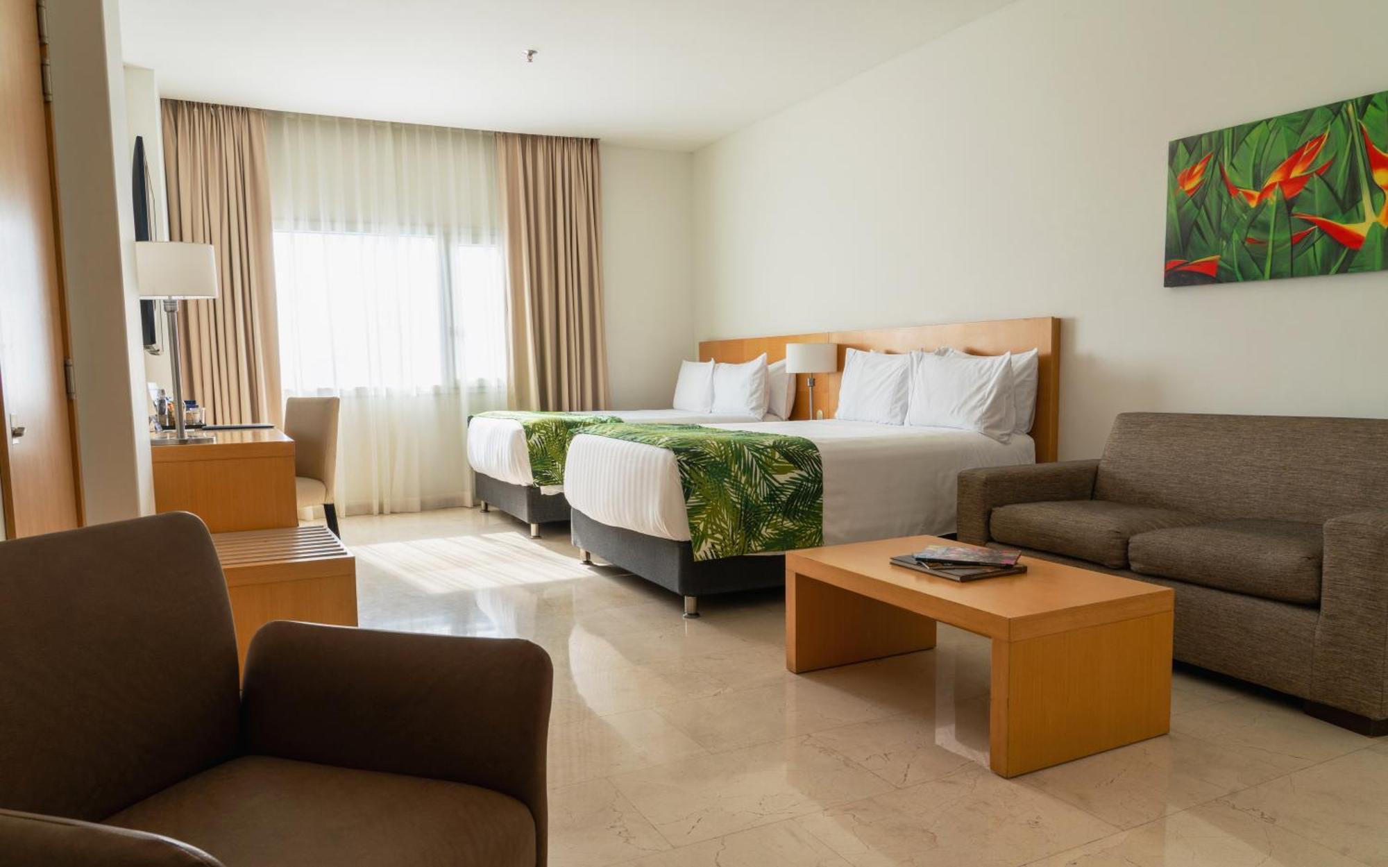 Hotel Dann Carlton Barranquilla Y Centro De Convenciones ภายนอก รูปภาพ A room at the hotel