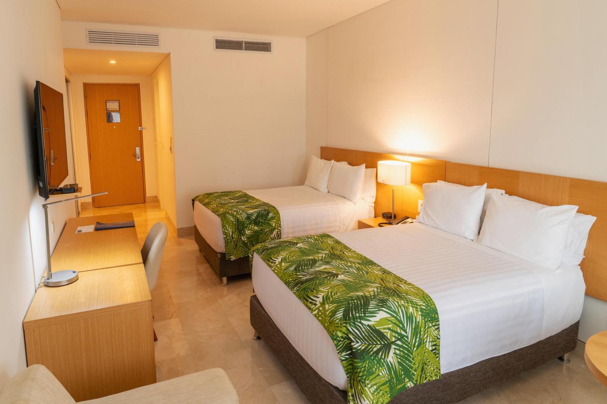 Hotel Dann Carlton Barranquilla Y Centro De Convenciones ภายนอก รูปภาพ A room at the Sheraton Waikiki
